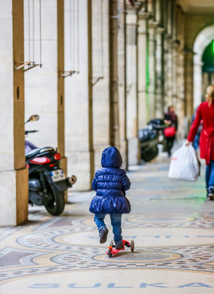 Parisian Girl keeping up with Mama while she shops! 